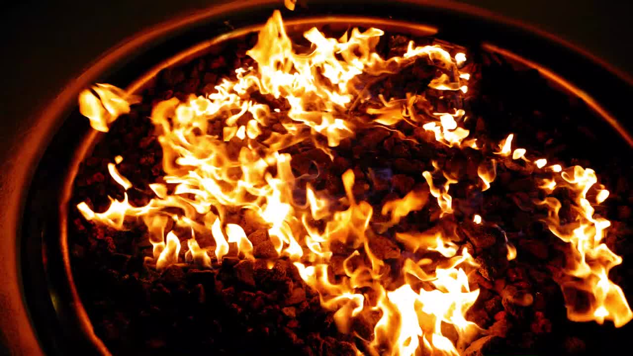 Close-Up of a Fiery Fire Pit at Night