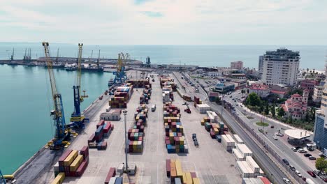 cargo port with cranes and containers near the