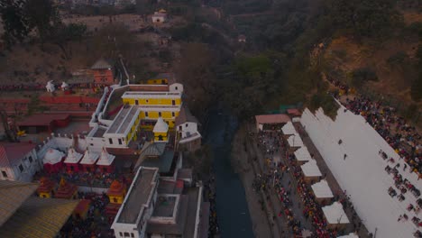 golden hour aerial drone footage of pashupatinath temple in kathmandu, captured on shivaratri, portrays the stunning beauty and rich culture of this iconic hindu temple