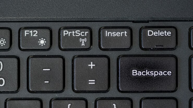 Top View Finger Pushing Backspace Keyboard Button