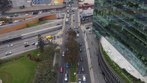 Drone-video-of-a-street-crossing-in-Miraflores-district-of-Lima,-Peru