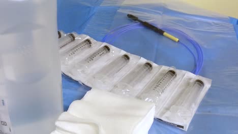 a pack of syringes in the surgery room
