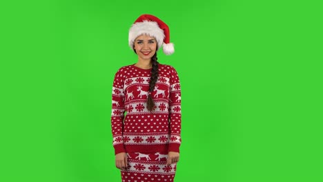 woman in christmas outfit on green screen