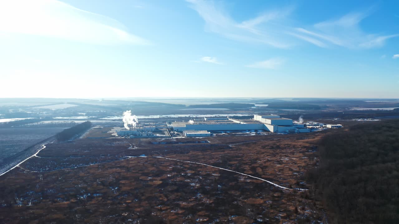 Industrial buildings from above. Aerial view of industrial zone and technology park