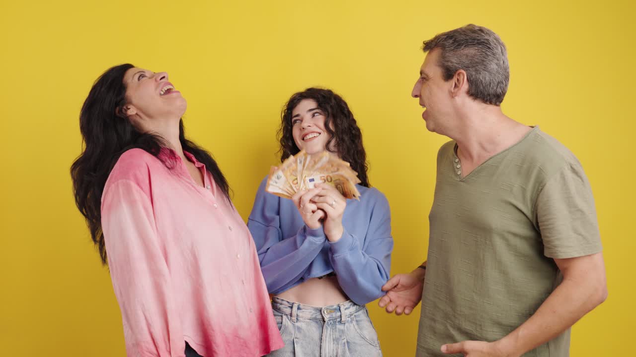 Family celebrates financial success