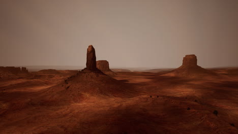 valle de monumentos: paisaje árido y formaciones rocosas rojas