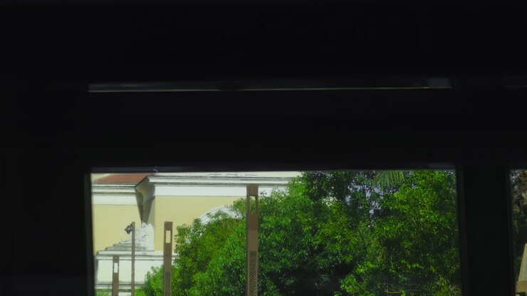 Bus Window View of Cityscape
