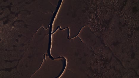 Aerial-View-Of-Muddy-Low-Tide-Landscape-In-Arcachon-Basin-Near-Gujan-Mestras-In-France