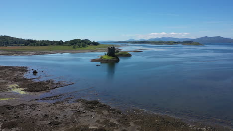 incredible drone shot of castle stalker, scotland