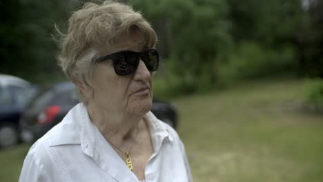 senior grandmother listening other person