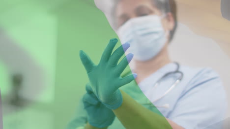 animación de la bandera de irlanda con una doctora con máscara facial poniéndose guantes quirúrgicos