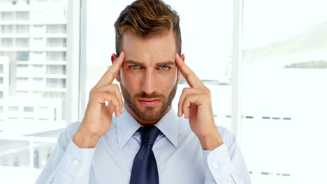 Businessman-having-a-migraine