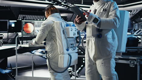astronaut conducting safety checks before stepping out for scheduled operations