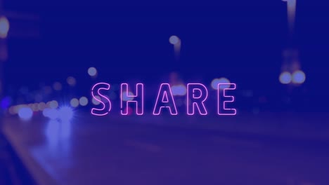 Animation-of-share-text-over-cityscape-at-night-on-blue-background