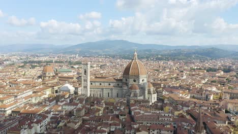 scenic aerial view of large cathedral in florence, italy on picturesque summer afternoon