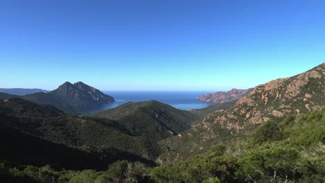 panoramic view of scandola unesco nature reserve in summer season, corsica island in france