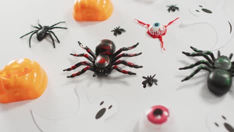 Close-up-view-of-multiple-halloween-toys-against-white-background