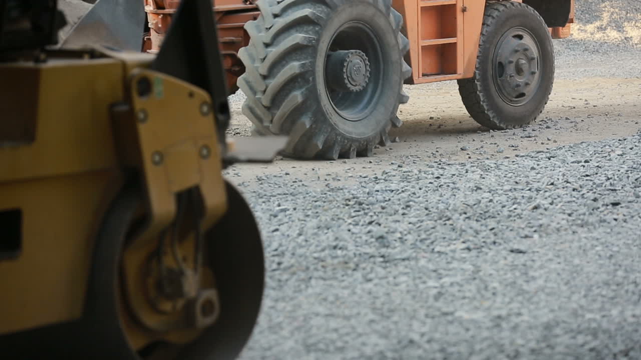 Road Roller Working On Road. Road roller working on the new road construction site