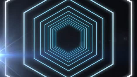 digital animation of hexagonal shapes in seamless motion against spot of light on black background