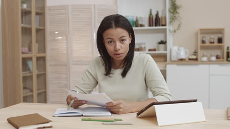 woman studying online from home