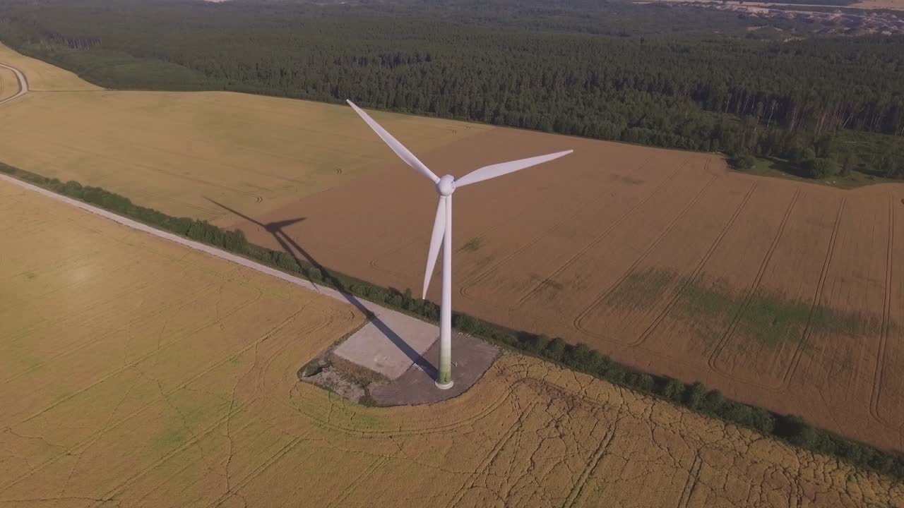 Wind Farm In Agricultural Fields On A Sunny Summer Day. Aerial Arc Right