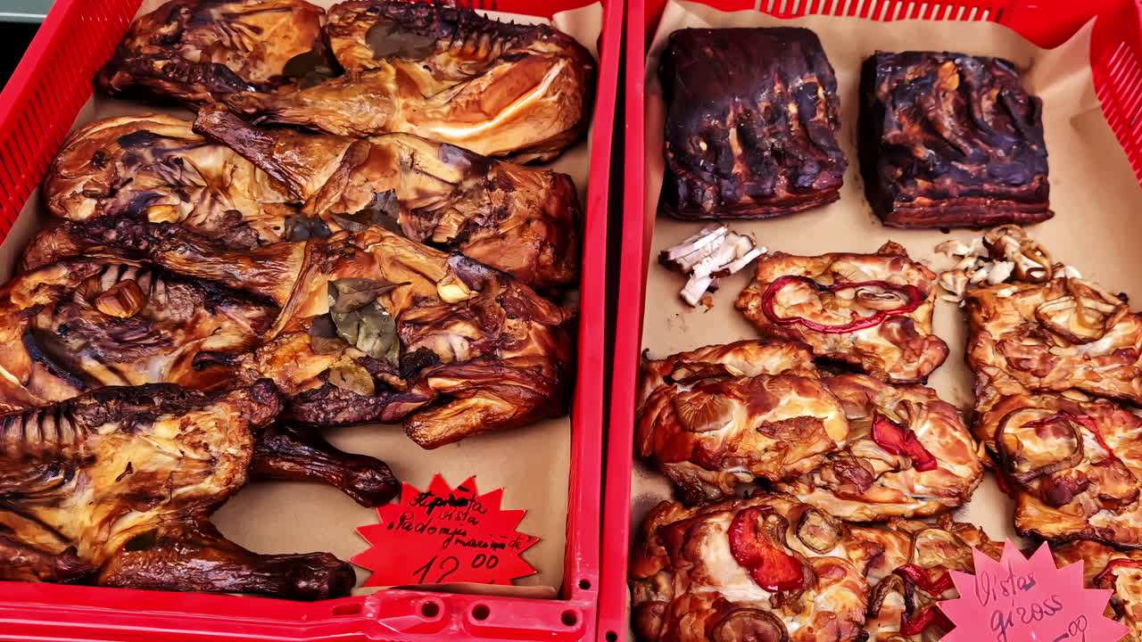 Smoked fish for sale in local market, close up motion view