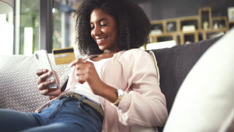 a young woman using a cellphone