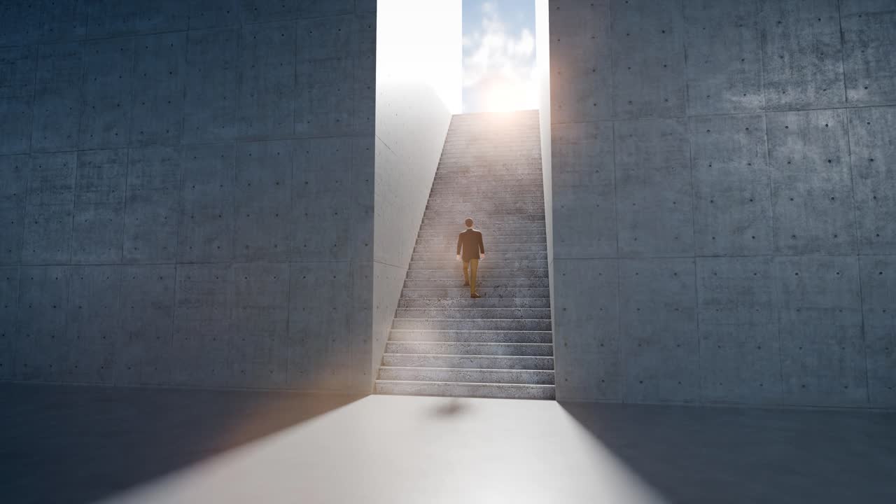 Man Walking Up Long Concrete Stairs Towards Bright Light