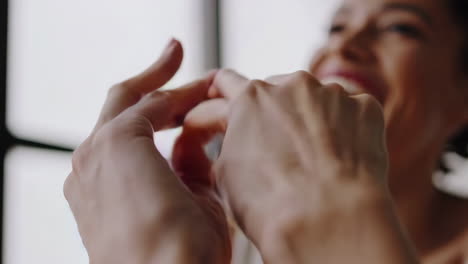 woman's hands and laughter