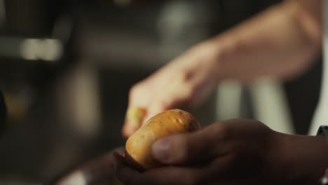 peeling potatoes close up peeling fresh potatoes