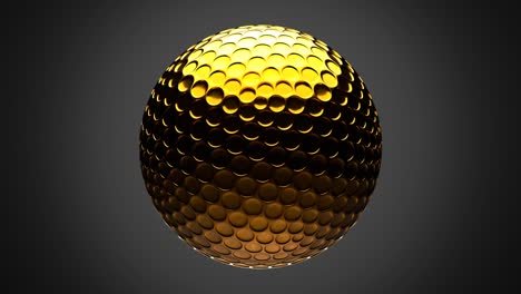 gold golf ball isolated on gray background.