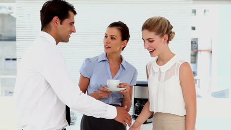 businesswomen chatting and meeting new staff member