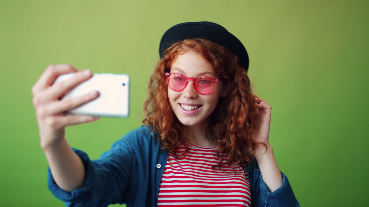 Teenage Girl Taking a Selfie Video Call