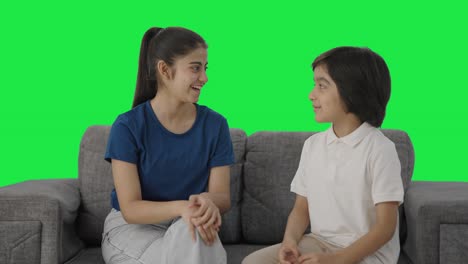 Indian-cousins-talking-at-home-Green-screen