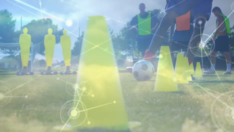 Animation-of-network-of-connections-over-football-players-practicing-on-football-field