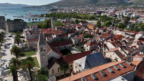 drone flight over trogir old town, showcasing kamerlengo castle and st. dominic church and monastery