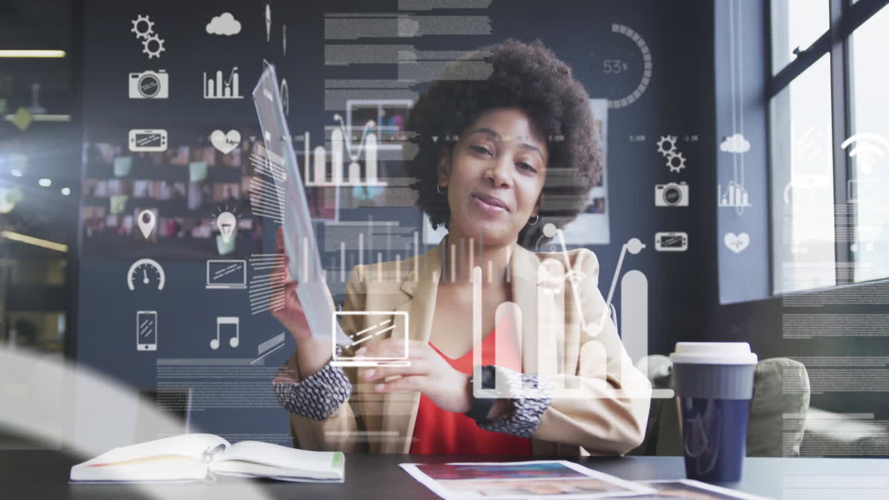 Smiling woman holding photo with data processing animation over office background