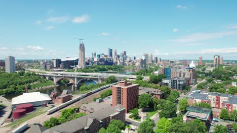 Drone-aerial-shot-of-the-Minneapolis-skyline-on-a-sunny-day-in-the-summer