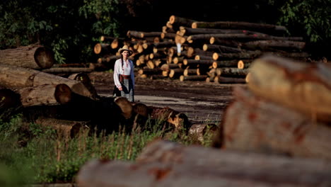 romanian girl walks through the cut trees 1