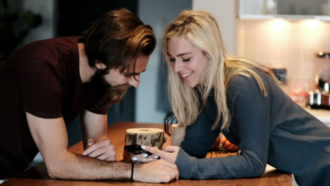 couple using mobile phone at home 4k