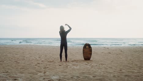 surfer preparing for a morning session at the beach