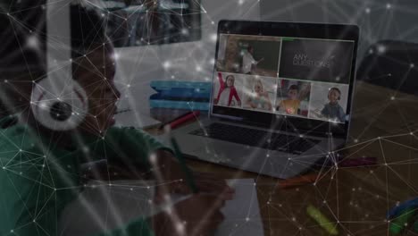 Animation-of-connections-over-african-american-boy-having-online-lessons-on-laptop