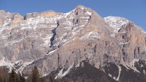 Close-up-View-of-the-Italian-Dolomites-Mountains,-Fir-Trees-and-Snowy-Landscape-near-the-Ski-Slopes