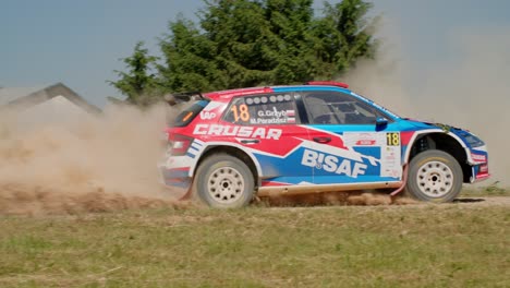 sport car taking a sharp turn in the sand