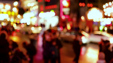 Blur-street-with-people-and-casino,-led-lights,-bright-lights,-street-filled-with-people-Niagara-Falls-Canada