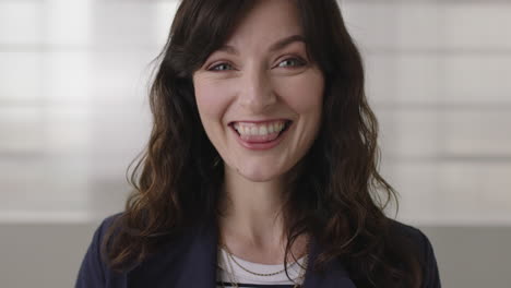 portrait-of-beautiful-young-business-woman-making-faces-looking-at-camera-laughing-happy-enjoying-silly-crazy-fun