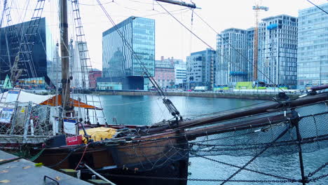 liverpool docks - boats and offices , business as the back drop