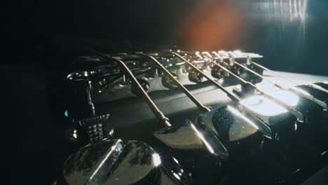 six-string electric guitar bridge and saddle.