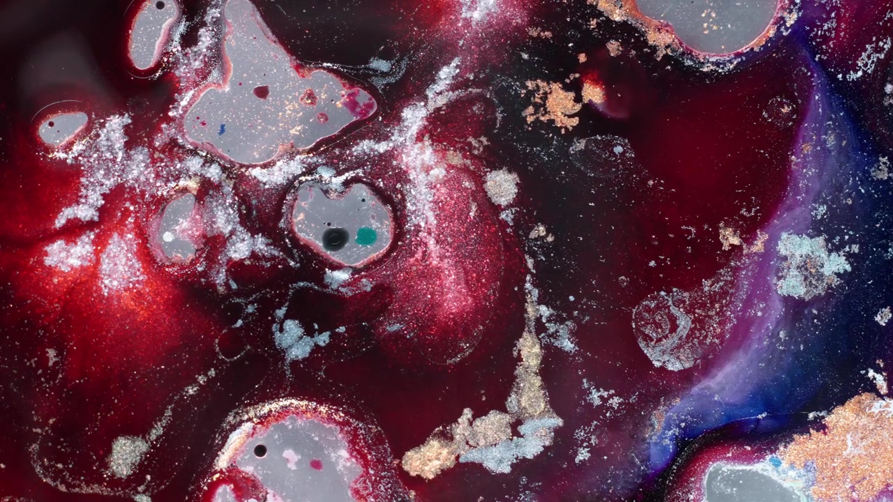 Macro top-down view of pink alcohol ink merging with metallic silver pigments. An evocative abstract sequence exploring color evolution and fluid emotions in high contrast.