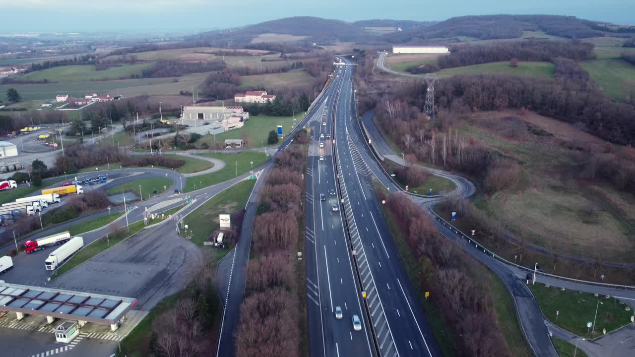 Aerial view of a highway winding through a rural landscape